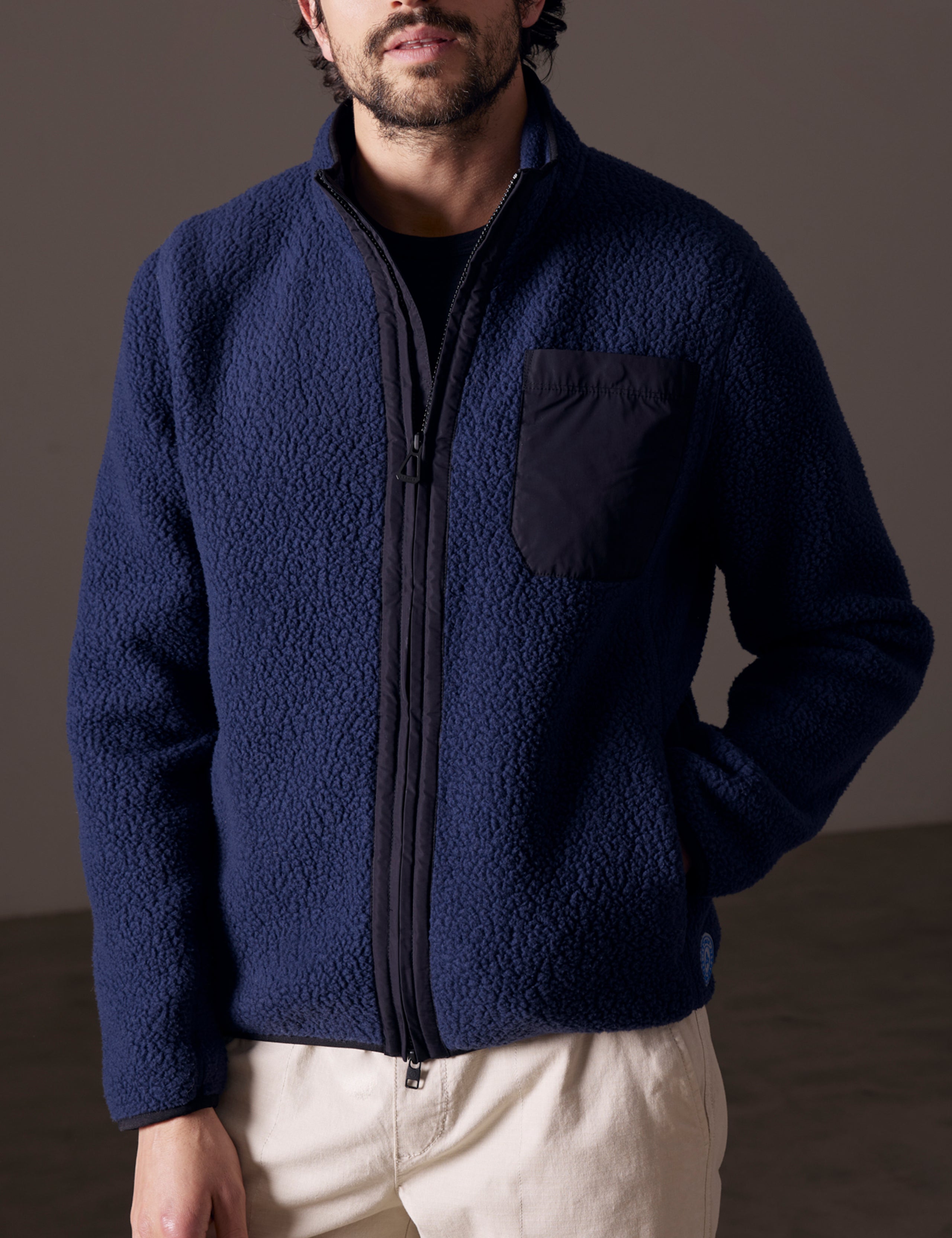Front body view of man wearing Walsh Full-Zip in Nordic Navy from AETHER Apparel.