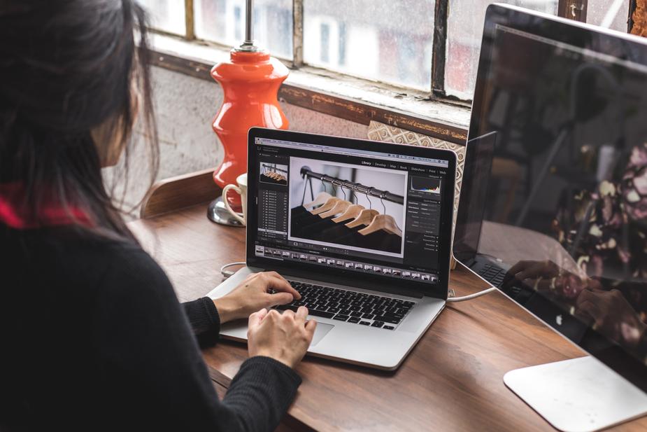 A woman edits product photos
